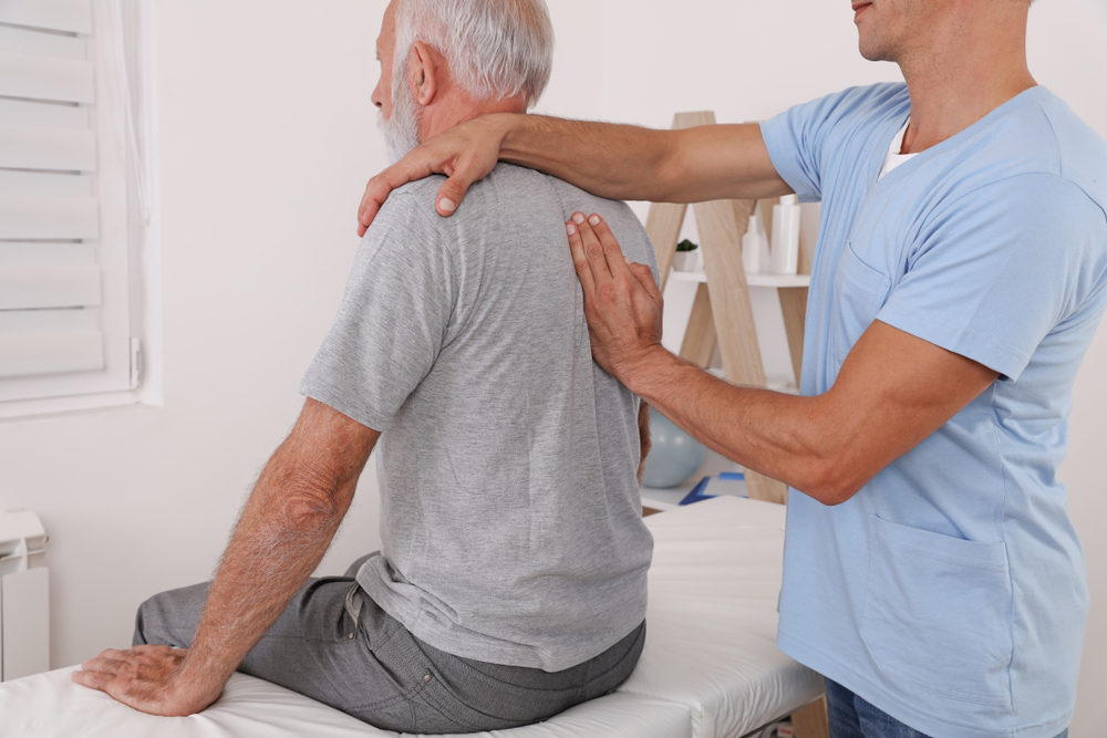Is It Bad to Crack Your Back? We Asked Doctors and Chiropractors